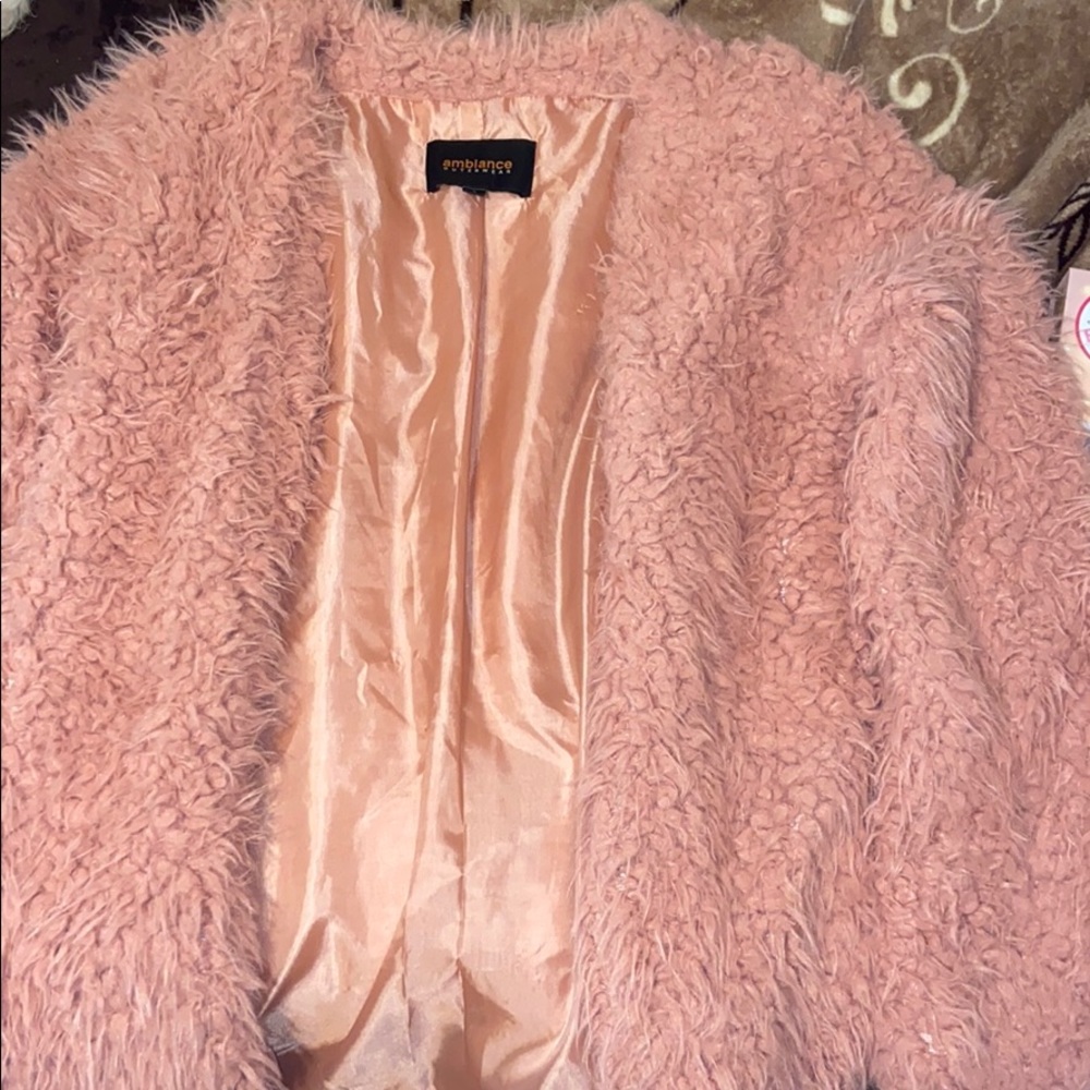 I am selling a light pink coat from fashion nova